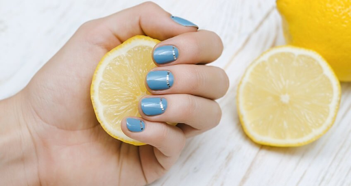 You can use lemon to remove nail polish. 