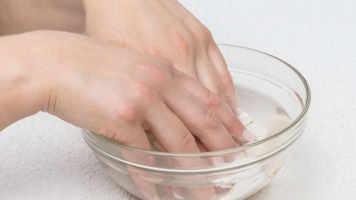 Make a salt water and coconut oil soak for your nails. You can repeat this process once every day for 4 to 6 weeks.  