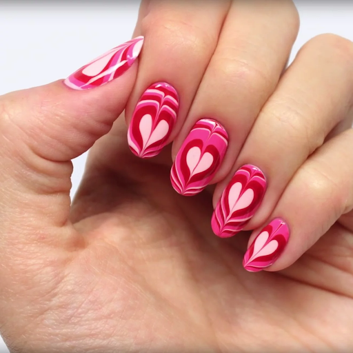 Water marbling nails are among the most popular trends in manicure