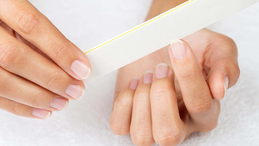 File your nails to make sure that your gel polish will not easily lift and peel 