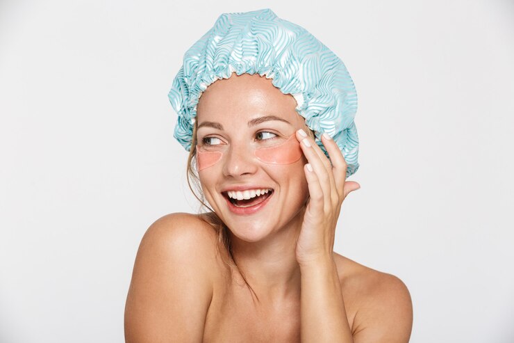 You should put on a dark-colored shower cap to protect your colored hair.