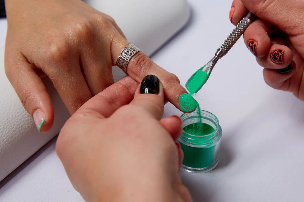 Can you put nail polish over acrylic powder?